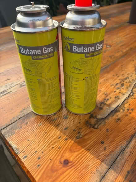 Photo of free Four butane gas canisters 227g each (Comberton DY10) #4