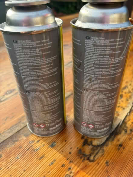 Photo of free Four butane gas canisters 227g each (Comberton DY10) #1