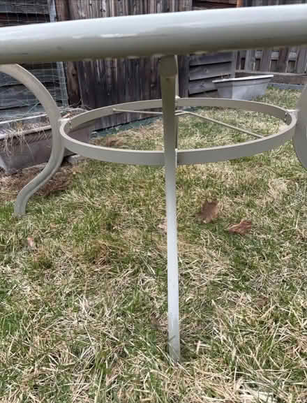 Photo of free Round glass & metal patio table (Prince of Wales at Meadowlands) #3