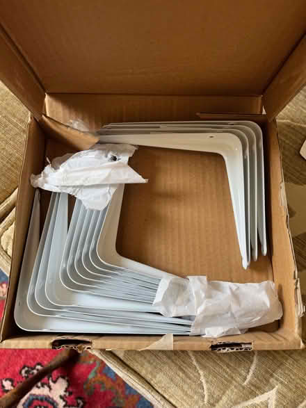 Photo of free 14 shelf brackets, white, pressed steel, 13cmx15cm - lots (Kennington SW8) #1