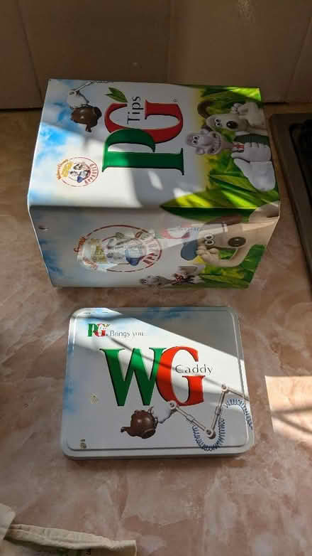 Photo of free Empty lindt tin and Wallace & Grommit PG tips tea caddy (Caldy Valley CH3) #4