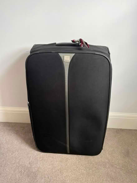 Photo of free Tripp large suitcase (Guiseley LS20) #1