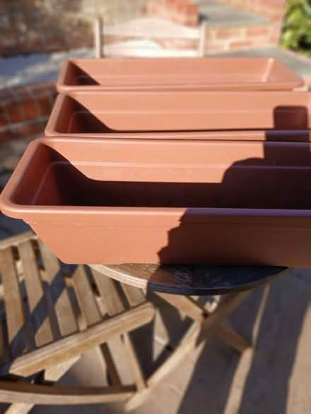 Photo of free Terracotta coloured plant troughs (Stone Cross) #1