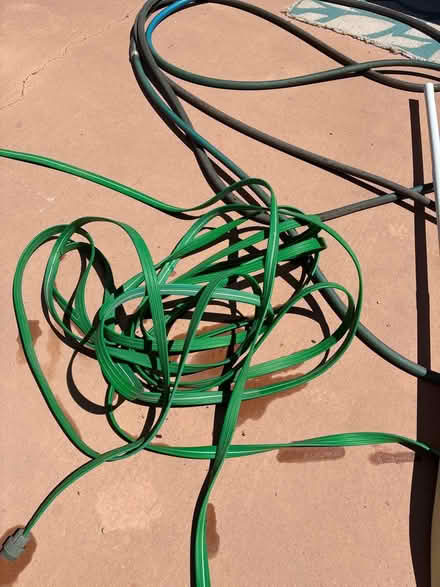 Photo of free 2 hoses 25 ft with 1 leak each (Encantado) #1