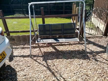 Photo of free 3 seater swinging garden chair (Pe14 8sh) #2