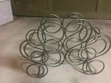 Photo of free Spiral metal wine rack (West Concord MA) #1