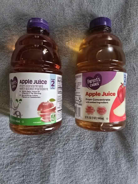 Photo of free 2 Apple Juice Bottles (West 7th) #1