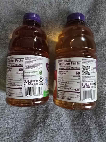 Photo of free 2 Apple Juice Bottles (West 7th) #2