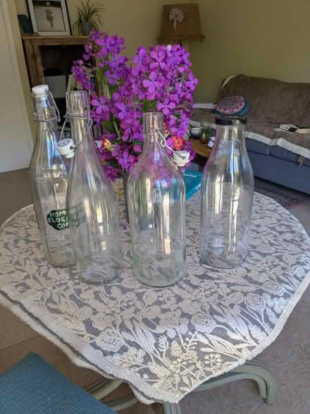 Photo of free 1 litre milk bottles 8 and cordial bottles (West Felton SY11) #1