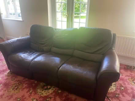Photo of free Nattuzi brown leather electric recliner in working order (Moss Side PR26) #1