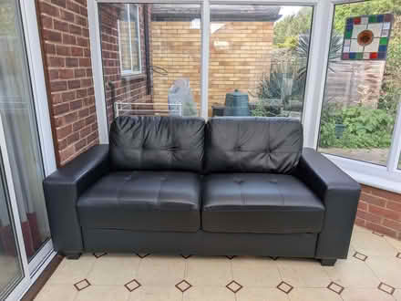Photo of free Black 2 seater couch (Hillingdon UB10) #1