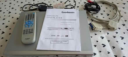 Photo of free DVD player and approx 40 DVDs - mixed content (Garforth LS25) #1