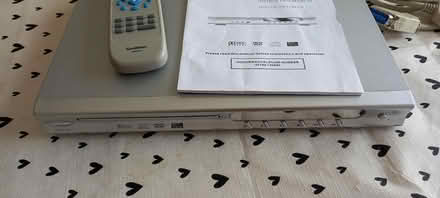 Photo of free DVD player and approx 40 DVDs - mixed content (Garforth LS25) #2