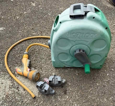 Photo of free Hozelock wall mounted reel and hose (Middleyard GL5) #1