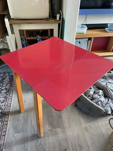 Photo of free Small red melamine table & 2 chairs (Northlands Wood) #1