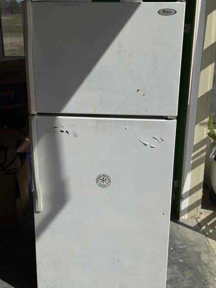 Photo of free Used whirlpool refrigerator (5 minutes away from airport) #1