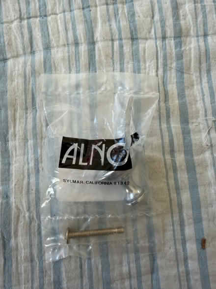 Photo of free 14 octagon silver knobs (Davis Sq) #2