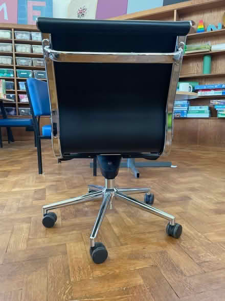 Photo of free Black leather office wheely chair (CR2) #3