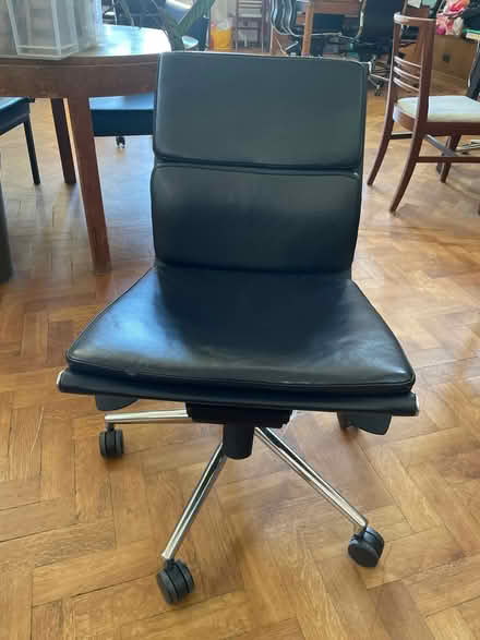 Photo of free Black leather office wheely chair (CR2) #1