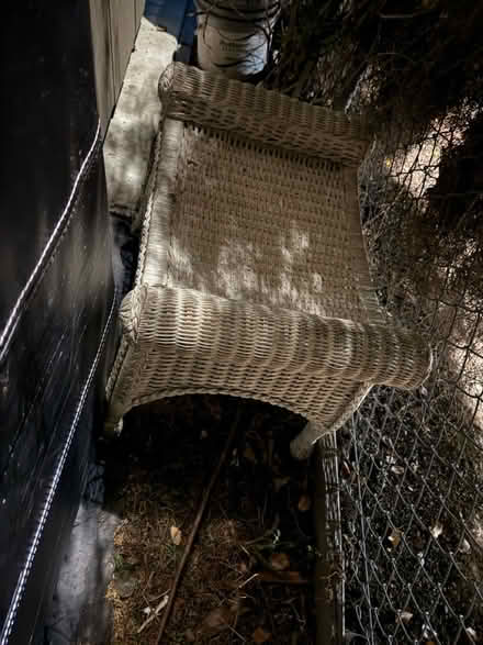 Photo of free Outdoor wicker bench (1075 Valencia Avenue) #1