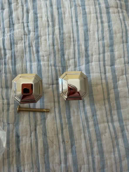 Photo of free 14 octagon silver knobs (Davis Sq) #3
