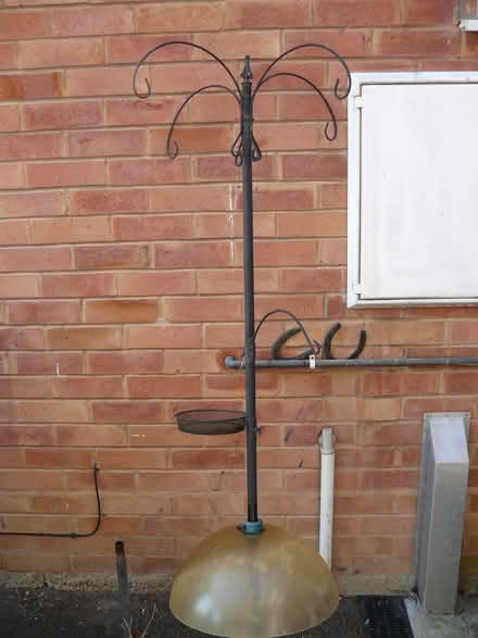 Photo of free Tall metal bird feeder holder. 5 arms + squirrel baffle (Kempsey WR5) #1