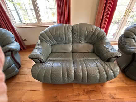 Photo of free Two Seater leather sofa olive green (Haldens AL6) #1
