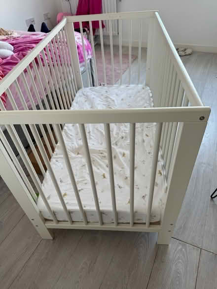 Photo of free IKEA baby bed with mattress (Barking Riverside IG11) #3