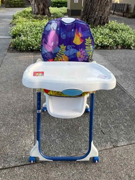 Photo of free Folding adjustable baby high chair (1075 Valencia Avenue) #1
