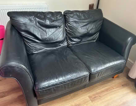 Photo of free Black leather 2 seater sofa (Great Dunmow) #1