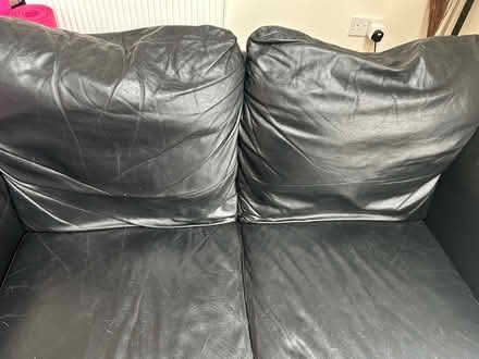 Photo of free Black leather 2 seater sofa (Great Dunmow) #4