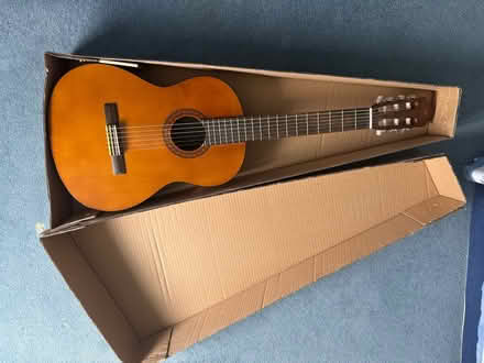 Photo of free Child's guitar (Millend OX7) #1