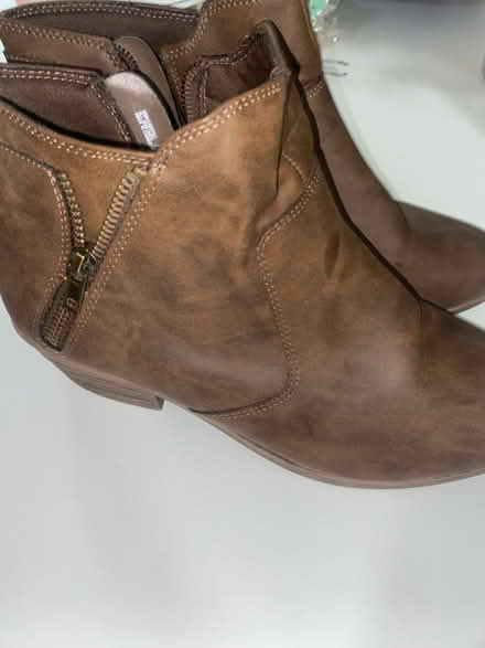Photo of free Size 7 1/2 Brown booties (Crumble cookie on w74th) #1