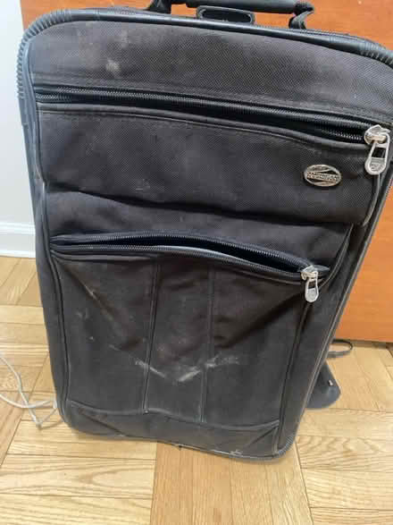 Photo of free Black carry on luggage (Crumble cookie on w74th) #1