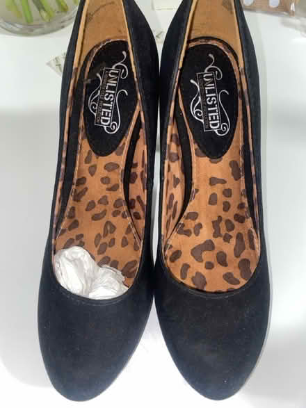 Photo of free Black sued stilettos women 7 1/2 (Crumble cookie on w74th) #2
