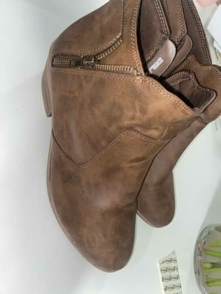Photo of free Size 7 1/2 Brown booties (Crumble cookie on w74th) #2