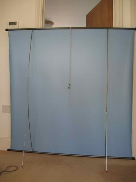 Photo of free Boots 50" x 50" projector screen, designed to stand on floor (Colby CA16) #1