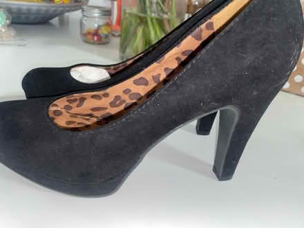 Photo of free Black sued stilettos women 7 1/2 (Crumble cookie on w74th) #1
