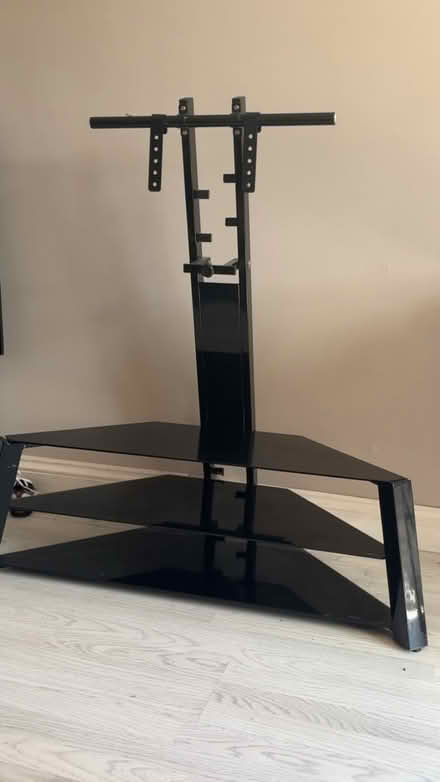 Photo of free Glass tv stand (Ub55tp) #1