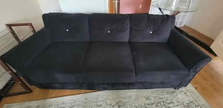 Photo of free 60" black couch (North Myrtle Beach G&T) #1