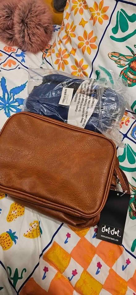 Photo of free Travel organizer, pillow & eye mask (Downtown DM) #2