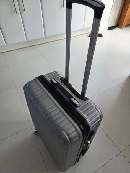 Photo of free Hard shell 4 wheeler suitcase (Barkingside IG5) #2