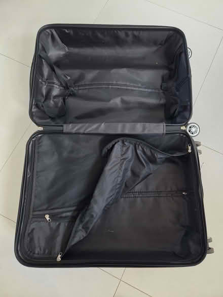 Photo of free Hard shell 4 wheeler suitcase (Barkingside IG5) #3