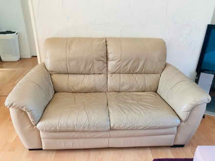 Photo of free 2 seater cream sofa (Woburn Gardens RG22) #1