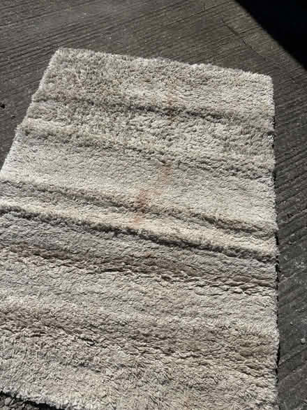 Photo of free Large beige rug (SK17 Buxton) #1