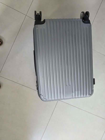 Photo of free Hard shell 4 wheeler suitcase (Barkingside IG5) #1