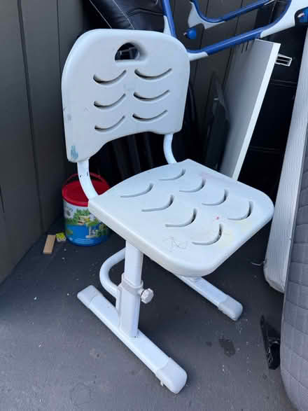 Photo of free Shower chair or kid’s desk chair (1075 Valencia Avenue) #1