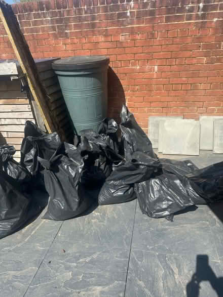 Photo of free Water butt and bags of soil (Hellingly) #1