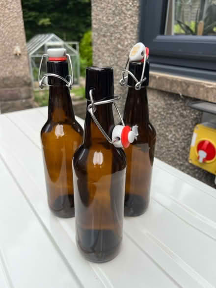 Photo of free 3 brown stopper bottles (Caton) #1