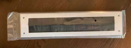 Photo of free Desk cable tidy / brush grommet (new) (Barnsbury N7) #1